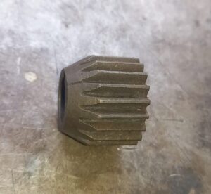 Engine shaft timing pinion